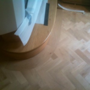 Large solid plank 20mm thick cut to make curve border around step
