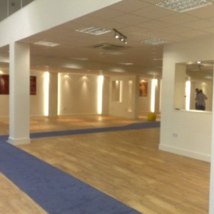 land of leather karndean with carpet walk ways