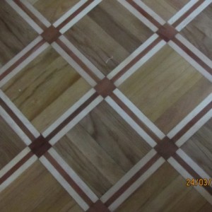 French Pattern

 Extremely impressive classic design of the old flooring. Oak and acacia squares arranged alternately with plum cubes. All surrounded with maple wood with plum insertion. 

 Material : oak, acacia, maple, plum tree